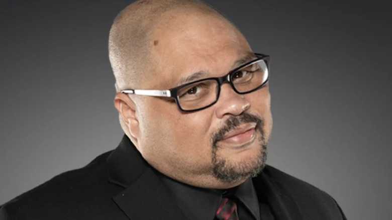 D'Lo Brown posing