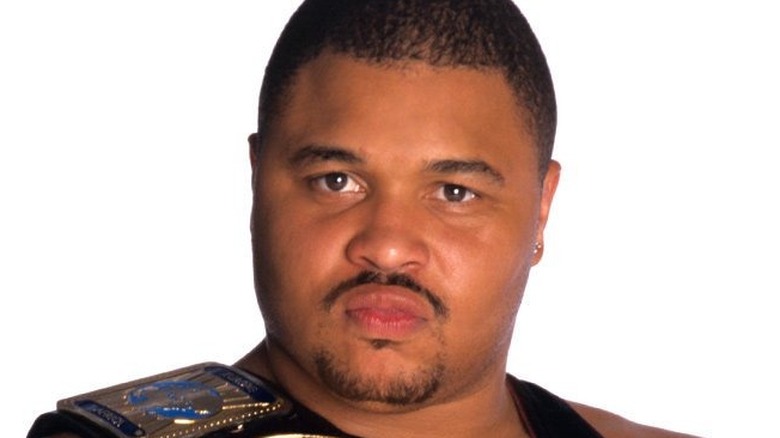 D'Lo Brown posing