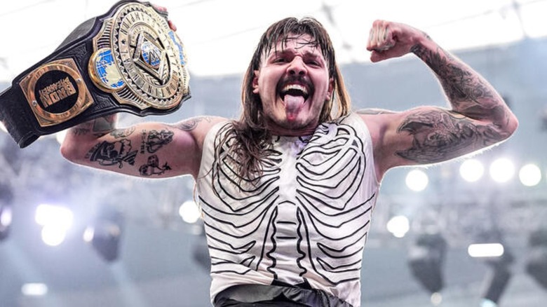 Dominik Mysterio celebrates Intercontinental title win