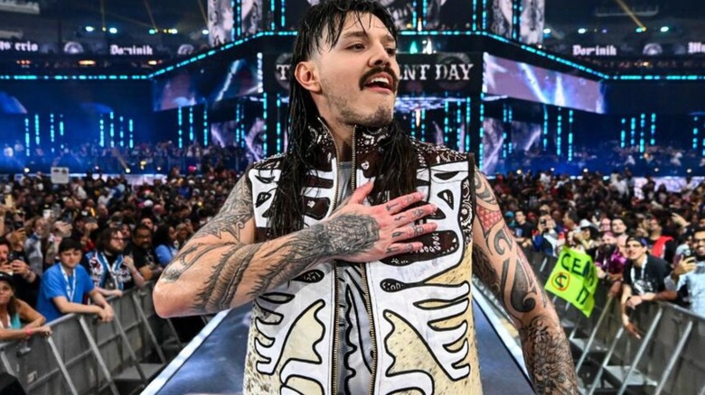 Dominik Mysterio poses on the ramp after a win on WWE programming/