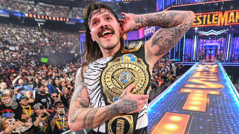 Dominik Mysterio celebrating his championship win at Wrestlemania 41