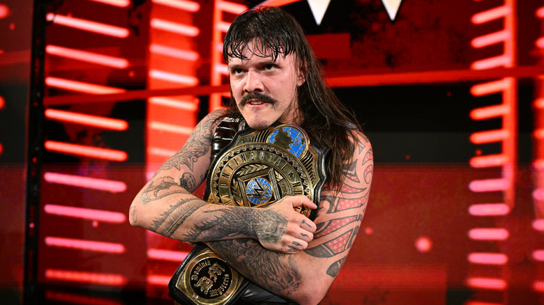 Dominik Mysterio with the Intercontinental Championship