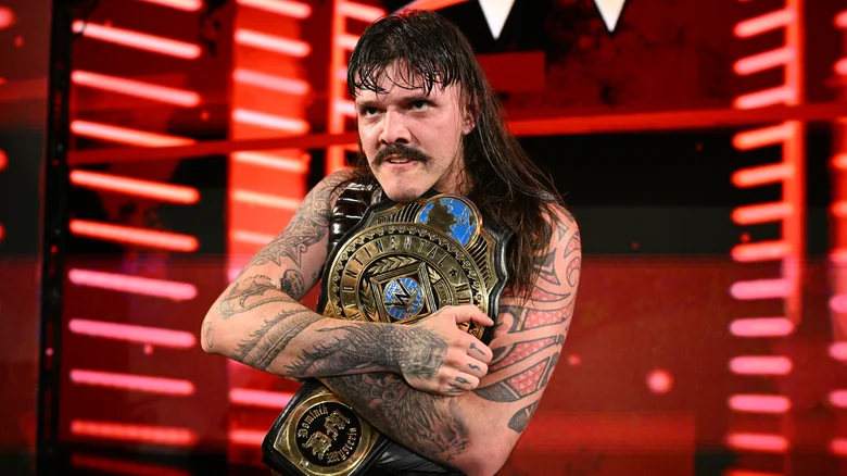 Dominik Mysterio celebrating with The Judgment Day