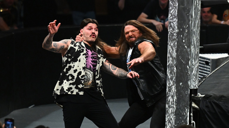 AJ Styles attacks Dominik Mysterio during Monday Night RAW at BP Pulse Live on August 25, 2025 in Birmingham, England.
