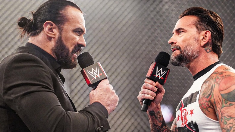 Drew McIntyre and CM Punk facing off against one another during a promo battle ahead of their Hell in a Cell match.