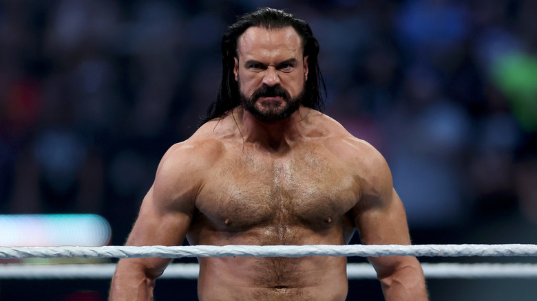Drew McIntyre looking angry in a wrestling ring