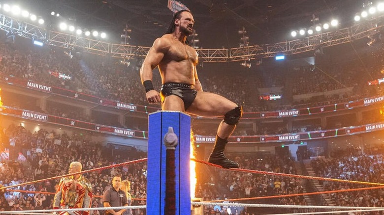 Drew McIntyre stands triumphantly on the ropes during his entrance at Saturday Night's Main Event before his match against Cody Rhodes.