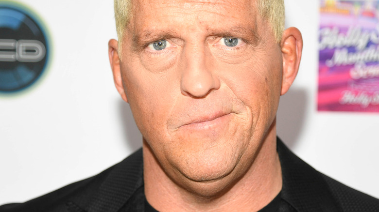 Dustin Rhodes smirking