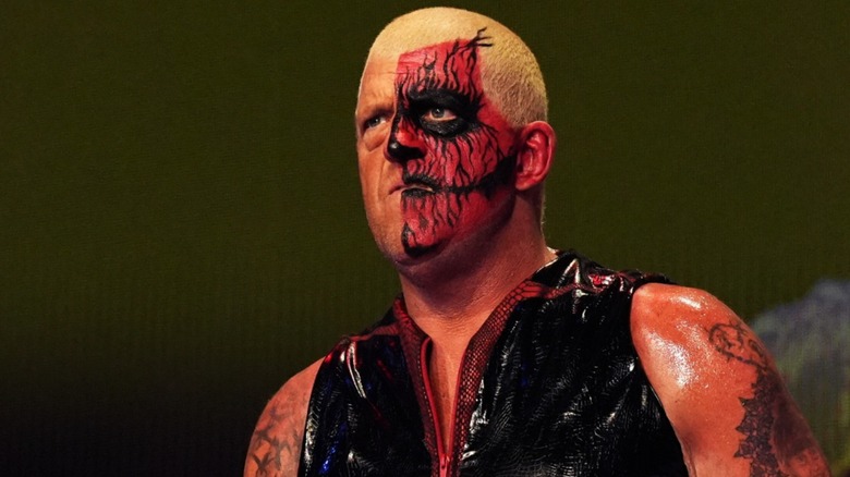 Dustin Rhodes walks to the ring