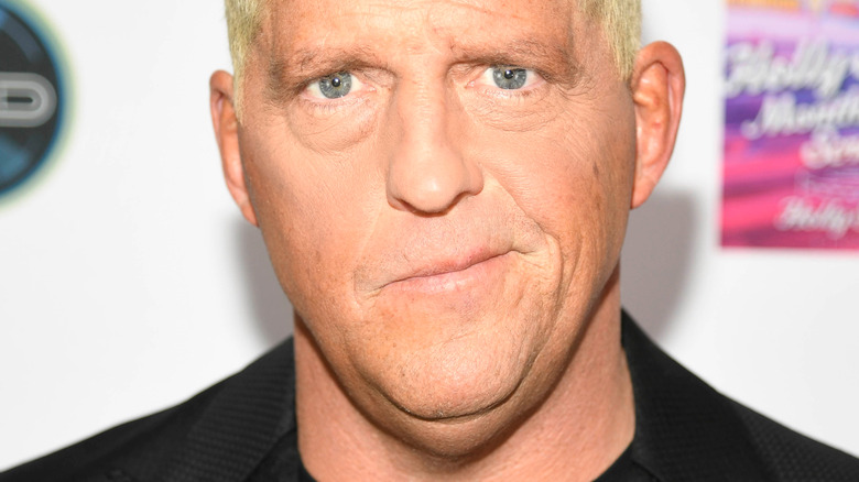 Dustin Rhodes purses lips