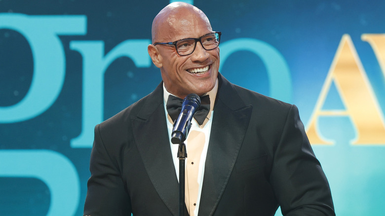 Dwayne "The Rock" Johnson accepts an award