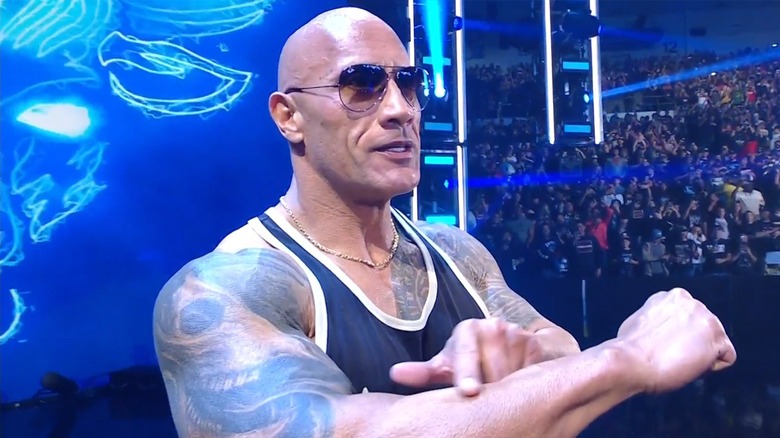 Dwayne Johnson points to the goosebumps on his arm