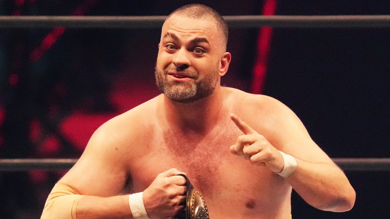 Eddie Kingston smiling and pointing