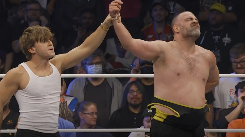 Eddie Kingston and Hook celebrate together