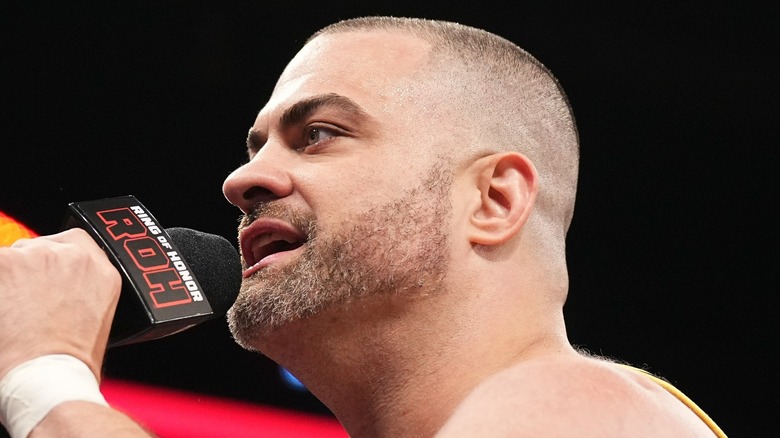 Eddie Kingston holds mic