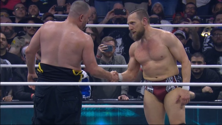 Bryan Danielson shakes Eddie Kingston's hand