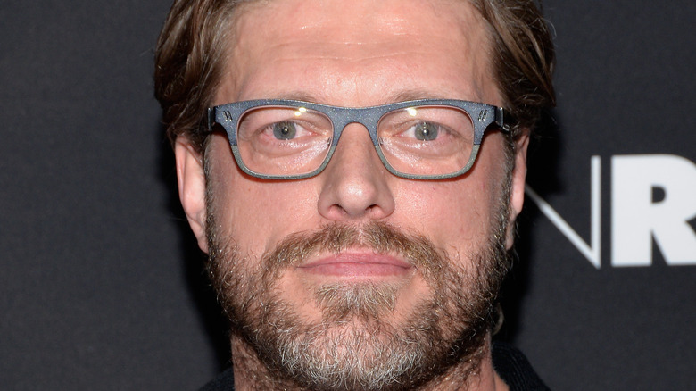 Edge wearing glasses 