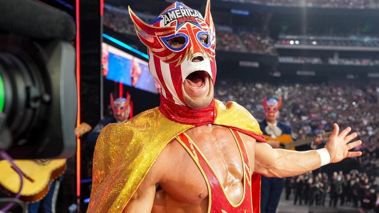 El Grande Americano posing at the top of the stage on his way to the ring.