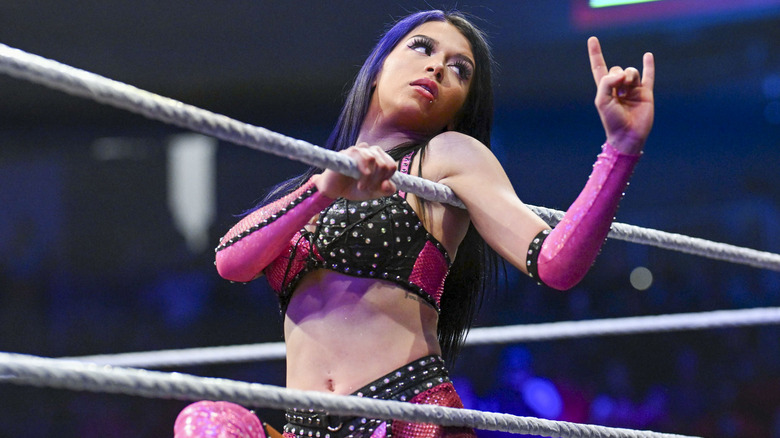 Cora Jade posing on the ring ropes