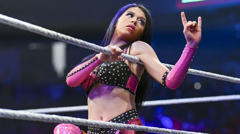 Cora Jade posing on the ring ropes