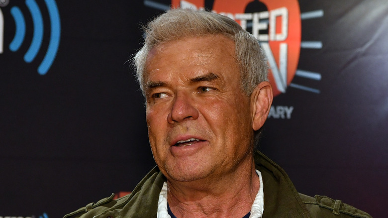 Eric Bischoff smiling while looking to his right side
