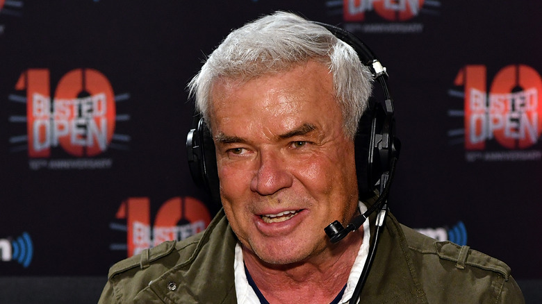 Eric Bischoff smiling while wearing a headset