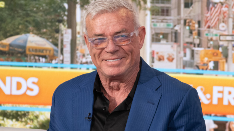 Eric Bischoff wearing clear glasses