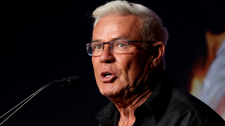 Eric Bischoff wearing glasses