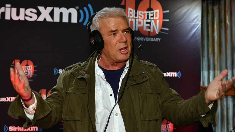 Eric Bischoff shrugging, unsure what else there is to say about Starrcade 1997