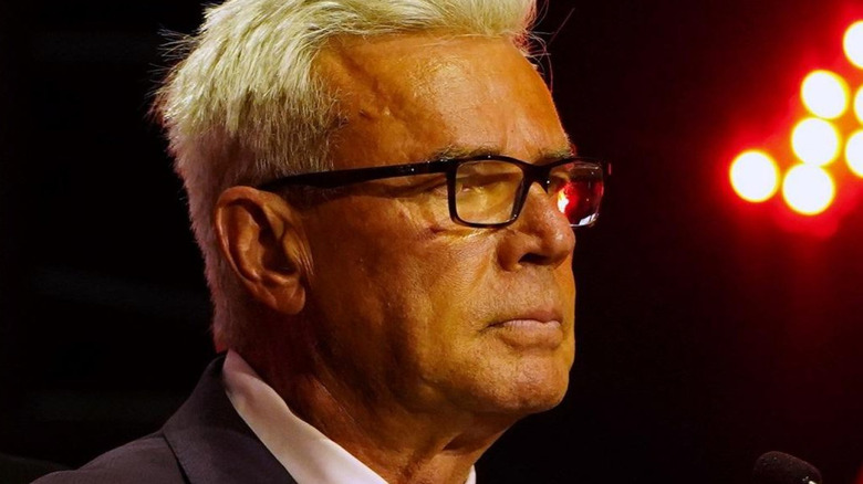 Eric Bischoff serious face glasses