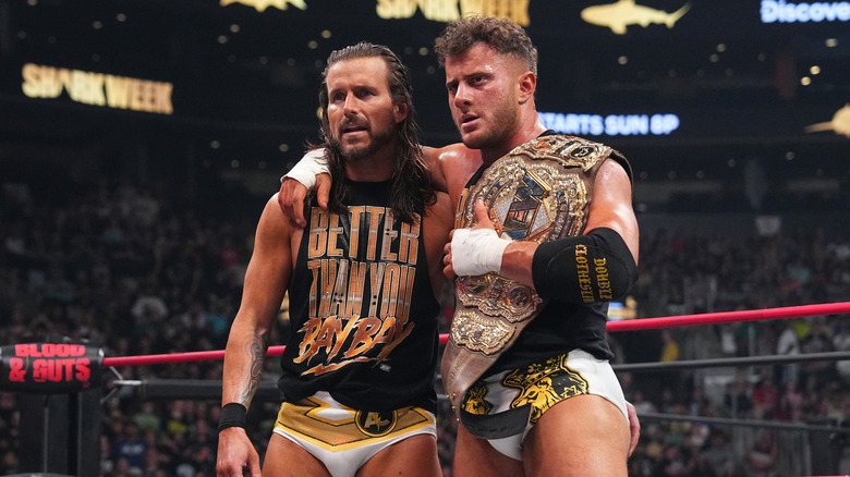 Adam Cole and MJF embrace in the ring