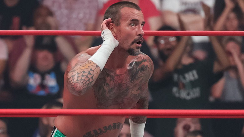 CM Punk listens to the crowd