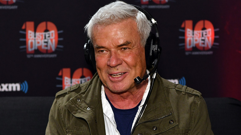 Eric Bischoff smiling and wearing a headset