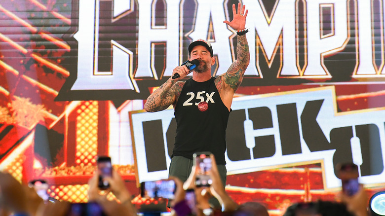 CM Punk talking to fans in Saudi Arabia