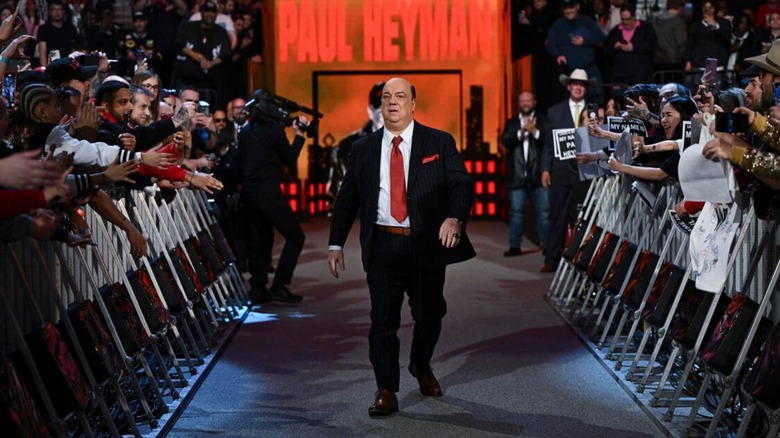 Paul Heyman heads down the ramp to the ring during his WWE Hall of Fame induction.
