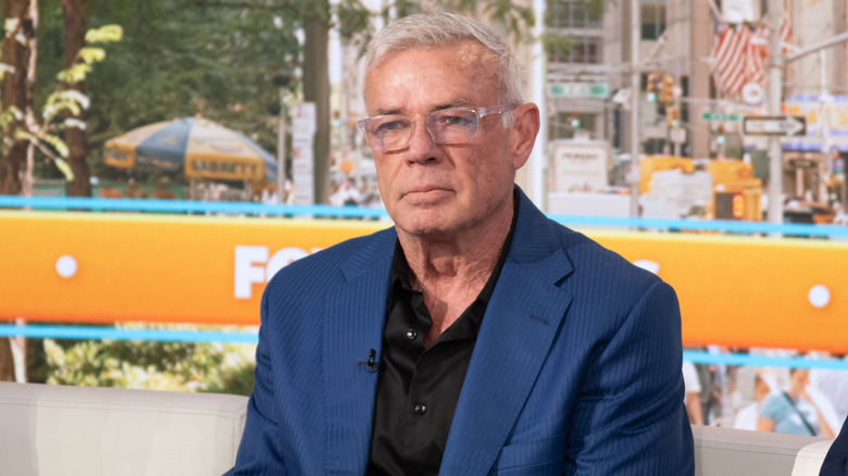 Eric Bischoff, sitting