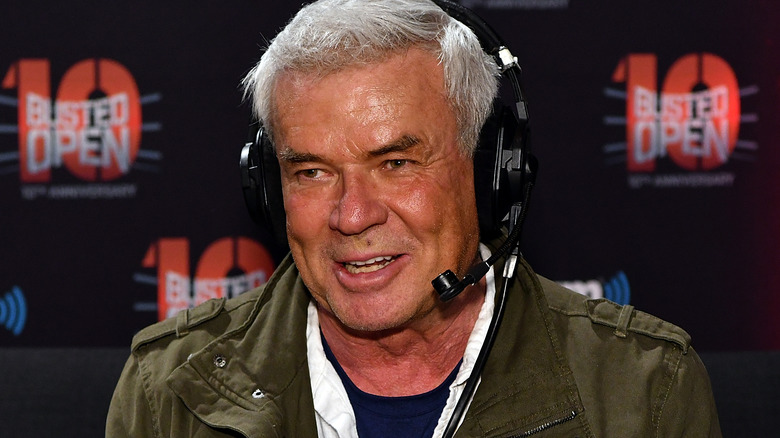 Eric Bischoff smiling and wearing a headset