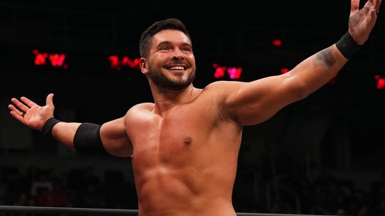 Ethan Page arms spread