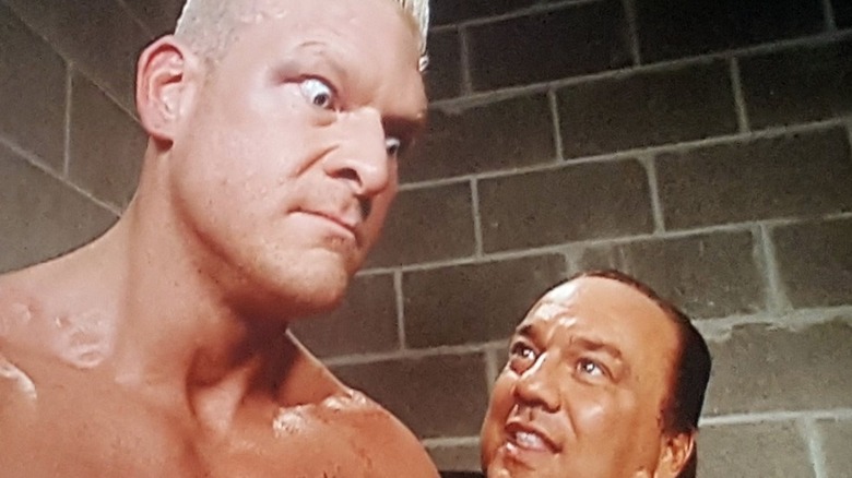 Heidenreich looks down at Paul Heyman