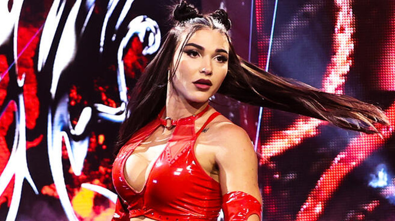 Jazmyn Nyx poses onstage before heading down to the ring for a match on "WWE NXT."