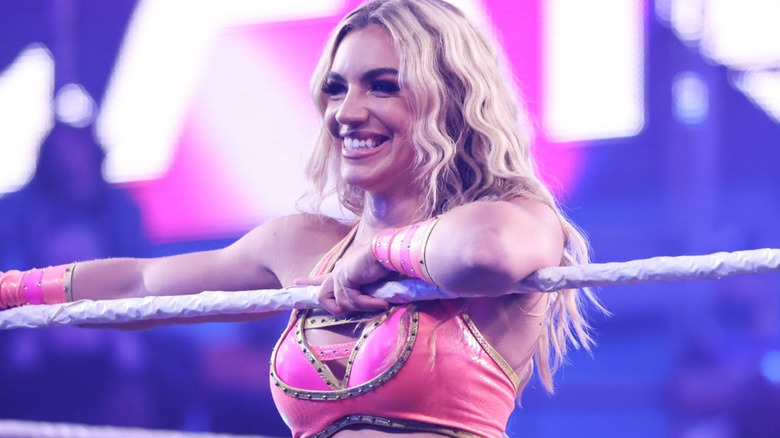 Carlee Bright leaning against the ring ropes