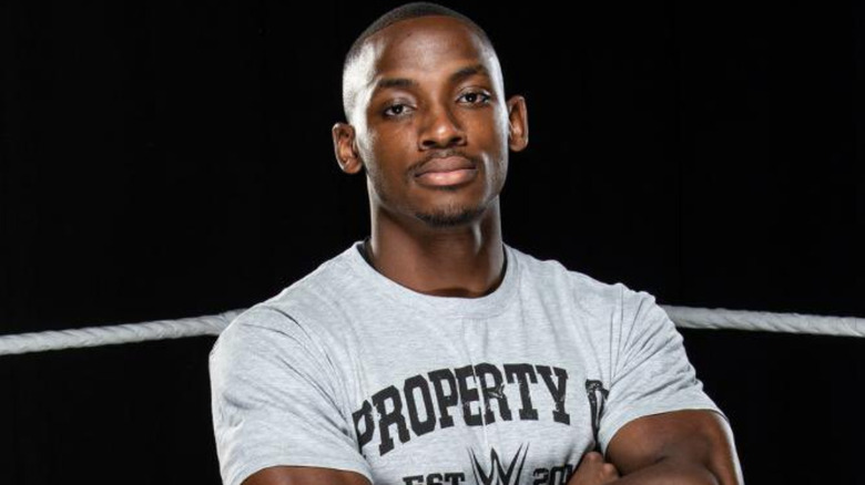 Malik Blade crossing his arms