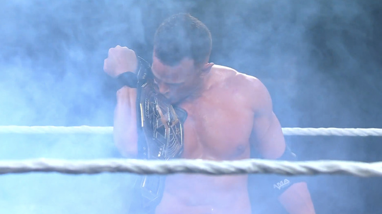 Ricky Saints celebrates with the NXT Championship