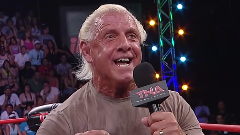 Ric Flair holds TNA mic