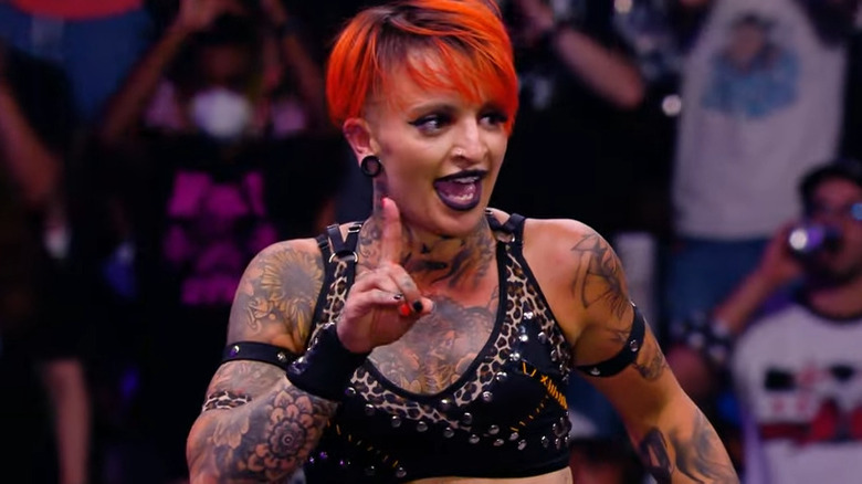 Ruby Soho inside the ring extending her index finger