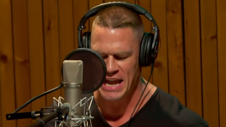 John Cena rapping in a recording studio
