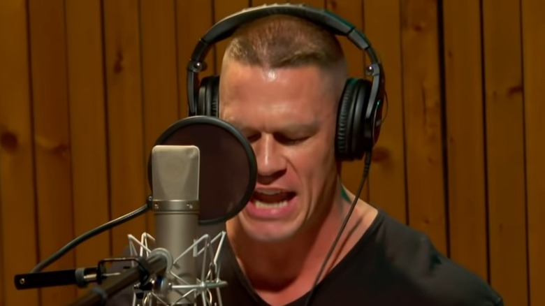 John Cena rapping in a recording studio