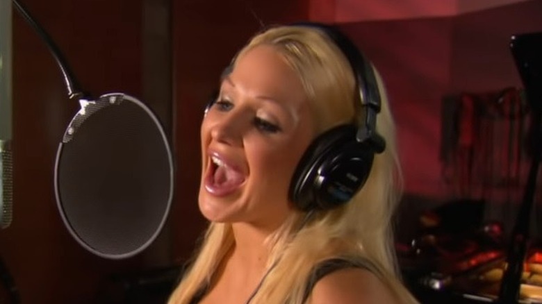 Jillian singing in a recording studio
