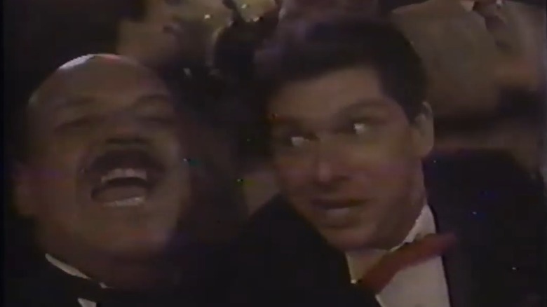 Gene Okerlund and Vince McMahon singing