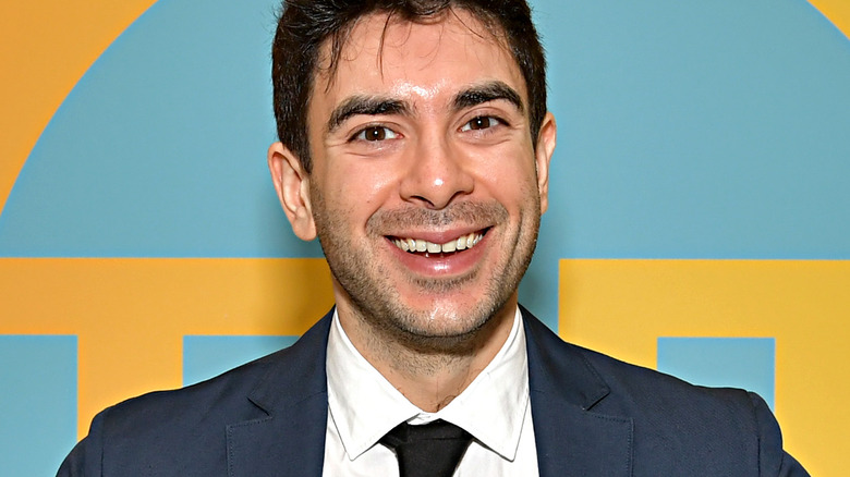 Tony Khan smiles